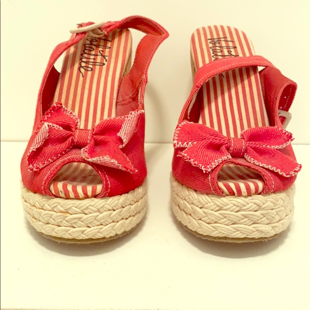 Volatile red open toe wedges.